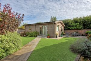 Granny Annexe at the bottom of a suburban garden with a path leading to the front door